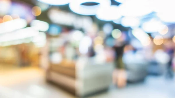 Fondo borroso de las compras de los clientes en la tienda de supermercados blu — Foto de Stock