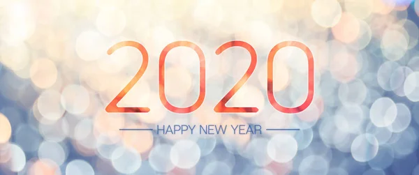 Happy New Year 2020 banner met bleke geel en blauw bokeh licht — Stockfoto