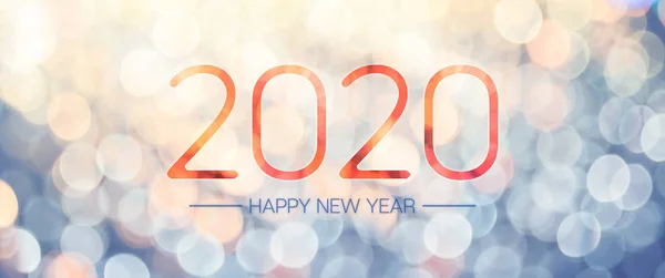 Frohes neues Jahr 2020 Banner mit blassgelbem und blauem Bokeh-Licht — Stockfoto