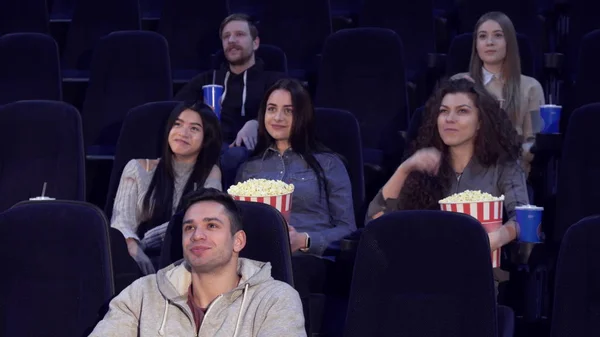 Young people watch film at the movie theater — Stock Photo, Image