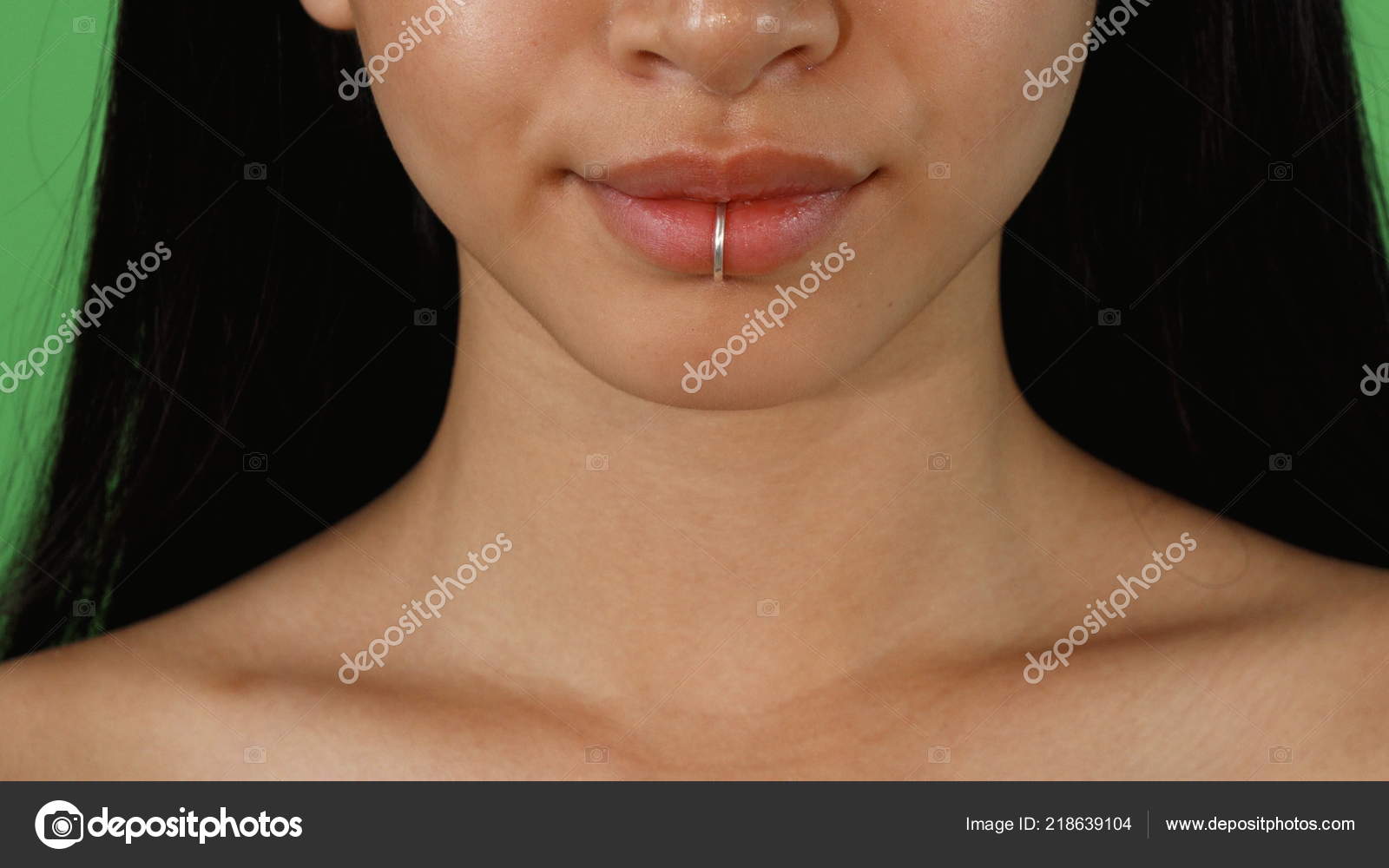 Female lips with lip ring piercing Stock Photo by ©kotlyarn 218639104