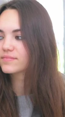 This close-up shot features a young couple, deeply immersed in a business consultation, their expressions radiating determination and collaboration. Set against a sleek, modern office backdrop, the scene captures the essence of teamwork and ambition
