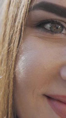 This vibrant close-up showcases a beautiful young woman with sparkling eyes and a dazzling smile, radiating pure joy. Her cheerful expression and natural beauty illuminate the scene, inviting warmth and positivity into the viewers heart