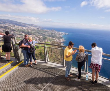 Madeira, Portugal - November 02, 2018: Tourists at Cabo Girao Skywalk viewpoint clipart