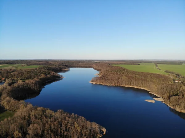 Aerial view of Lake Heinersdorfer See, located 40 kilometres east of Berlin near the B5 in Heinersdorf (Steinhfel), It is divided by a road dam into the Small and Large Heinersdorfer See.