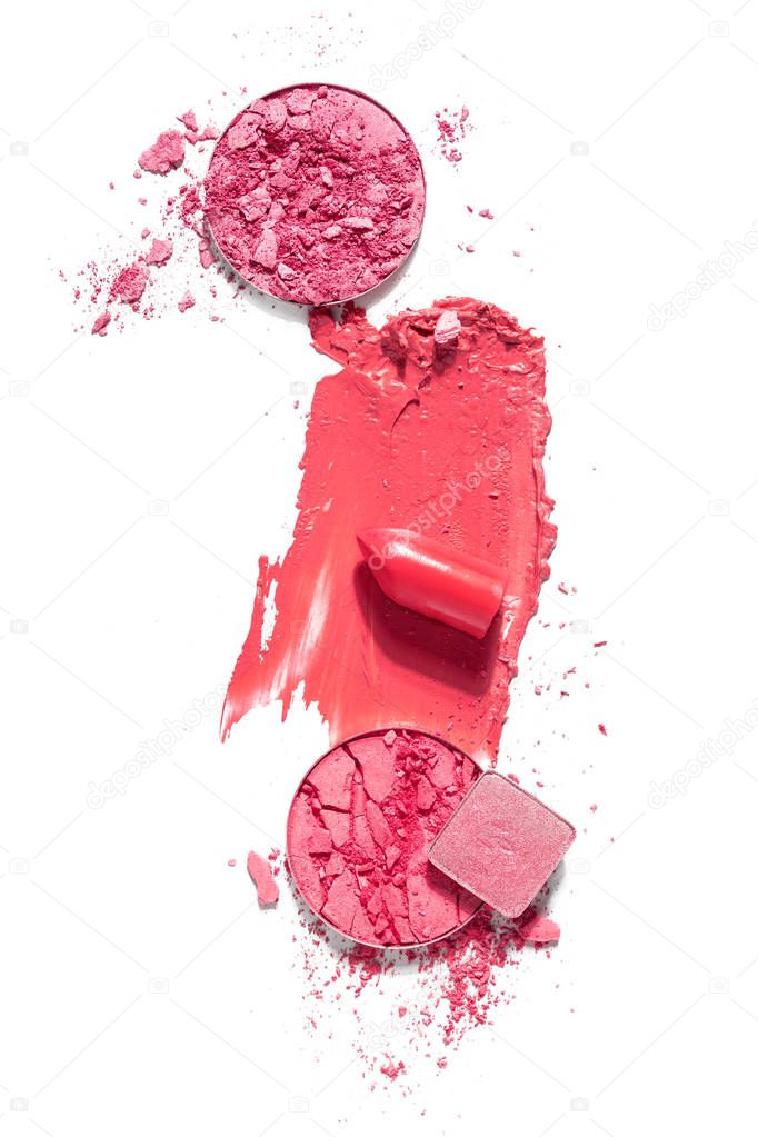 Creative concept photo of cosmetics swatches on white background.