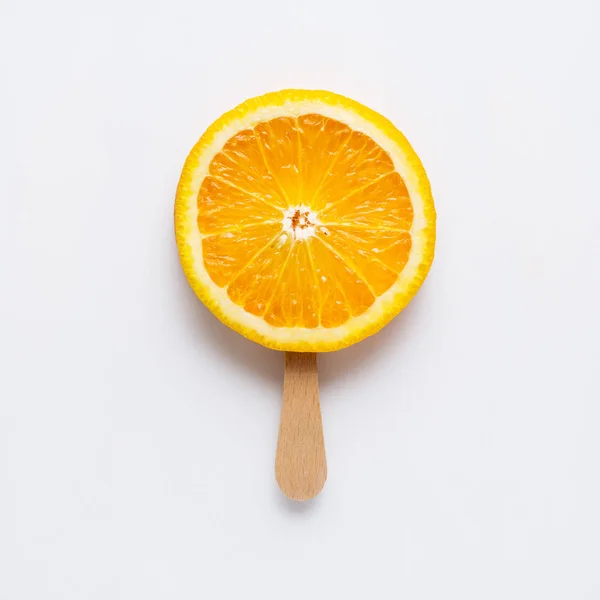 Creative Concept Photo Orange Slice Arranged Ice Cream Popsicle Grey — Stock Photo, Image