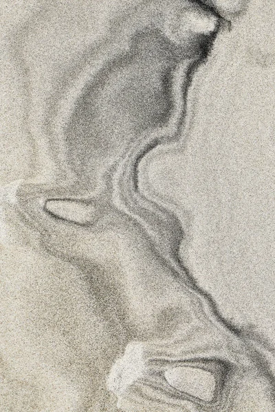 Темные Пятна Песке — стоковое фото