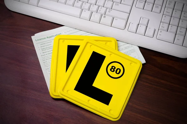 Two Plates License Application Laying Computer Desk Next White Keyboard — Stock Photo, Image