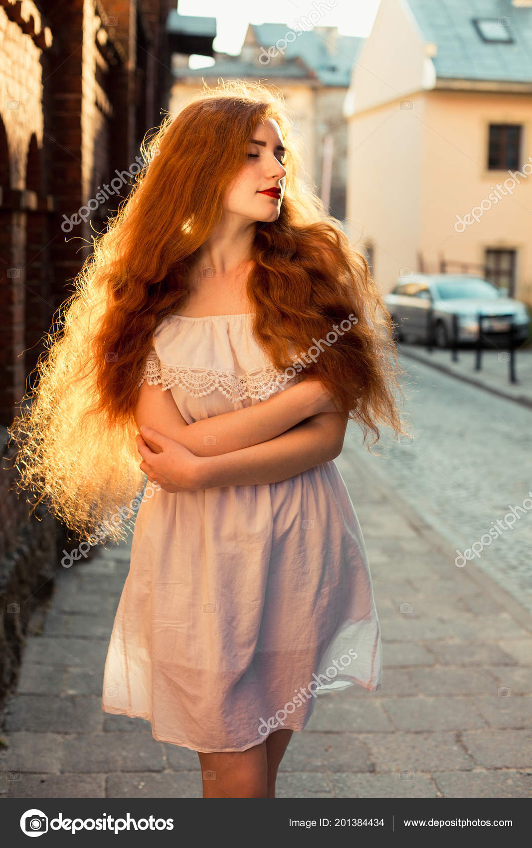 Tender Red Haired Woman Long Curly Hair Wearing White Dress