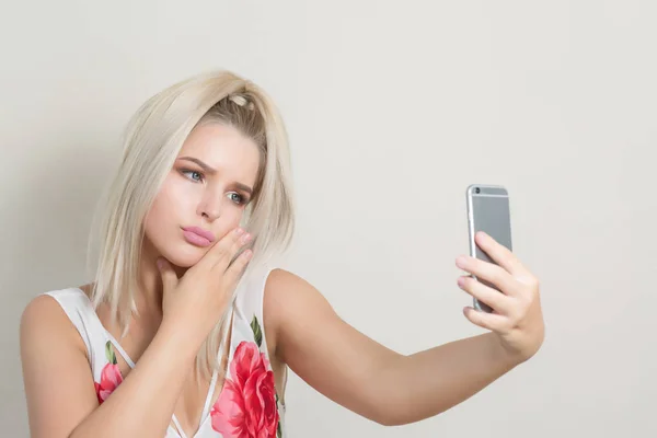 Emotional Blonde Woman Making Selfie Mobile Phone Grey Background — Stock Photo, Image