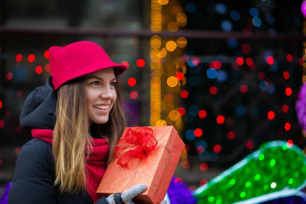 Magnificent Smiling Woman Wearing Red Hat Knitted Scarf Holding Gift — Stock Photo, Image