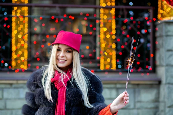 Emotional Blonde Woman Celebrating New Year Sparklers Blurred City Lights — Stock Photo, Image