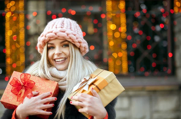 Splendid Blonde Woman Dressed Warm Outfit Holding Gift Boxes Background — Stock Photo, Image
