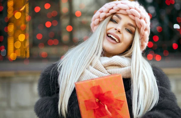 Stunning Blonde Girl Wearing Knitted Cap Warm Coat Holding Gift — Stock Photo, Image