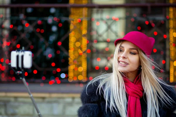 Fashionable Blonde Woman Tourist Wearing Funny Hat Taking Selfie City Stock Image