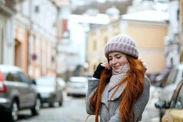 Pleased Red Haired Woman Wearing Warm Winter Clothes Walking Street — Stock Photo, Image