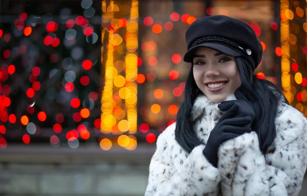 Happy Brunette Girl Wearing Cap Posing Street Garlands Background Bokeh — Stock Photo, Image