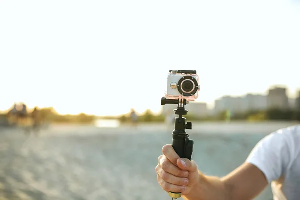 Young Man Holding Action Camera Desert Space Text — Stock Photo, Image