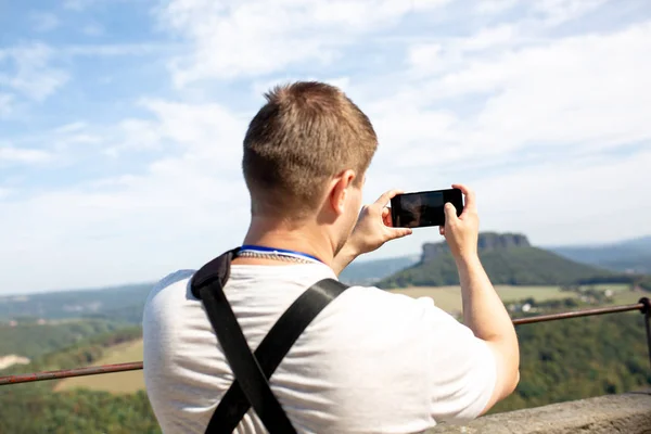 Man Uses His Mobile Phone Outdoor Taking Photo Landscape Park — Stock Photo, Image