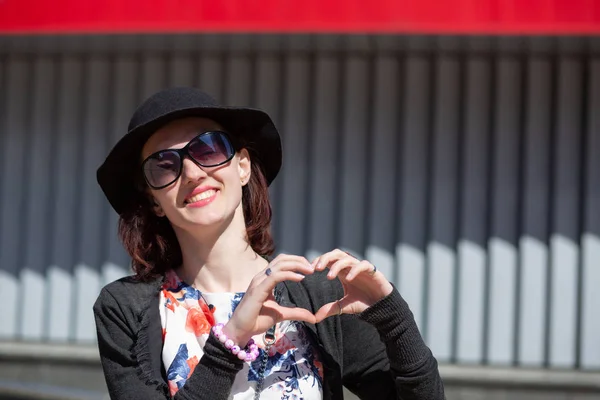 Merry Brunette Woman Wearing Hat Showing Heart Symbol Her Fingers — Stock Photo, Image