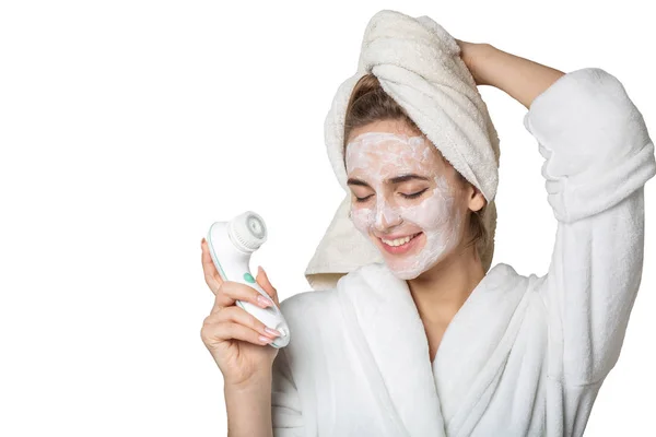 Charming brunette model posing with moisturizing cream mask usin — Stock Photo, Image