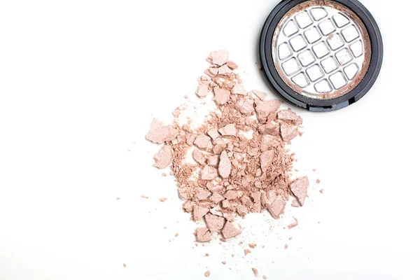 Pieces of broken cosmetic highlighter — Stock Photo, Image