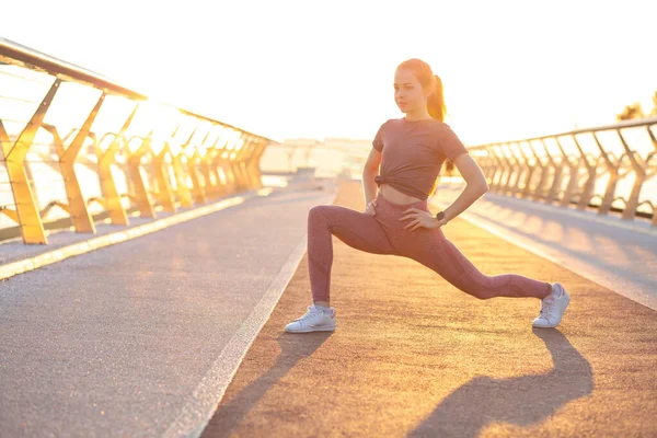 Slim Red Haired Teenage Girl Warming Workout Bridge Rays Sun — Stock Photo, Image