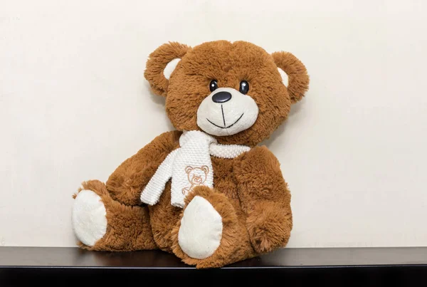Teddy bear soft toy in child's bedroom