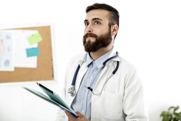 Young Doctor Holding His Stethoscope — Stock Photo, Image