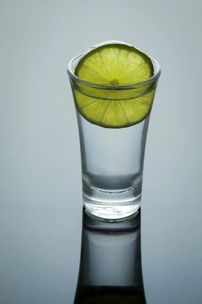 Tequila shot with salt and lemon — Stock Photo, Image