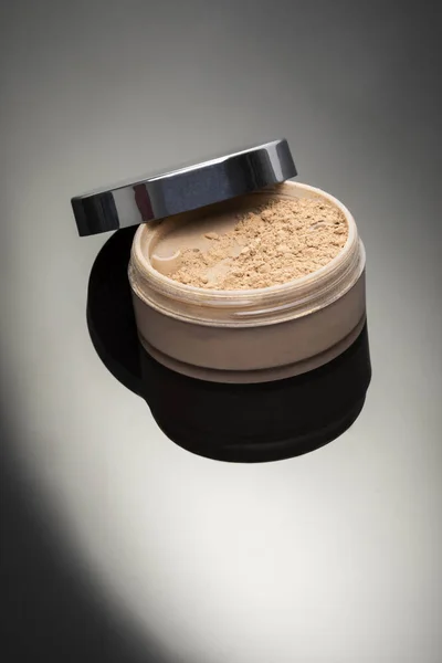 Elegant container with powder for skin color makeup. — Stock Photo, Image