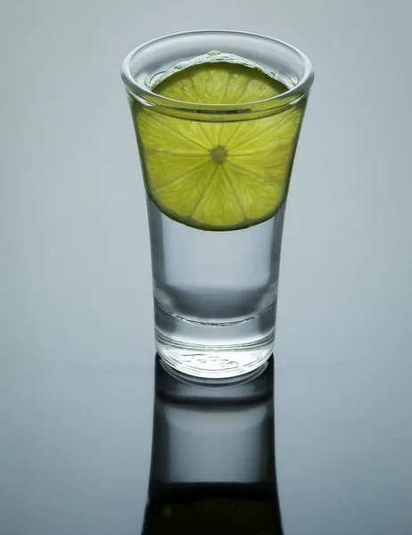 Tequila shot with salt and lemon — Stock Photo, Image