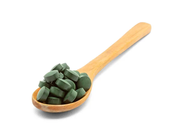 Wooden Spoon Green Pills White Background — Stock Photo, Image
