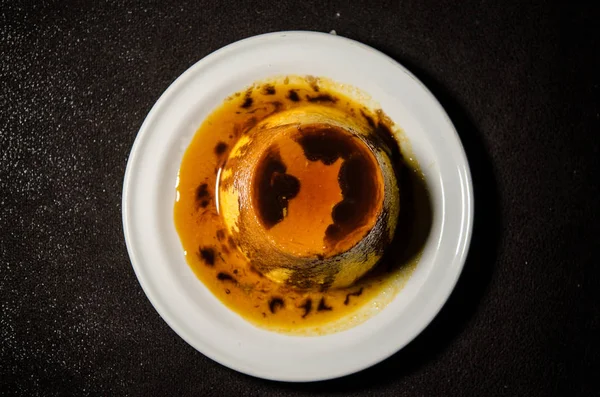 Flan, a latin american, european delicacy. a great dessert. is a type of egg custard that came to Latin America via Spain. It usually is covered by melted caramel.