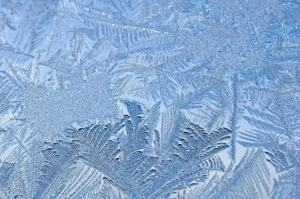 Frost on the winter window glass — Stock Photo, Image