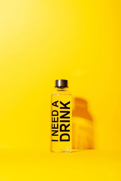 Need Drink Water Bottle Yellow Background — Stock Photo, Image