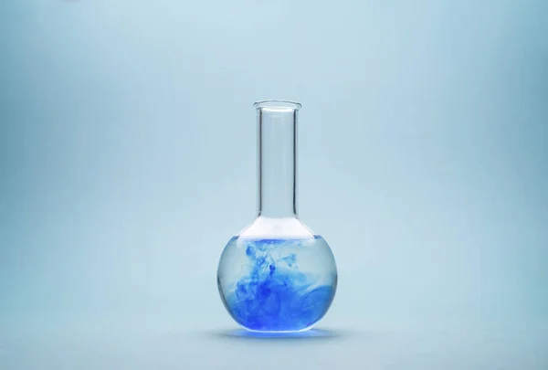 Bottom Flask Blue Background — Stock Photo, Image