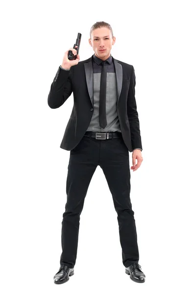 Homem Bonito Terno Preto Uma Pistola Posando Sobre Fundo Branco — Fotografia de Stock