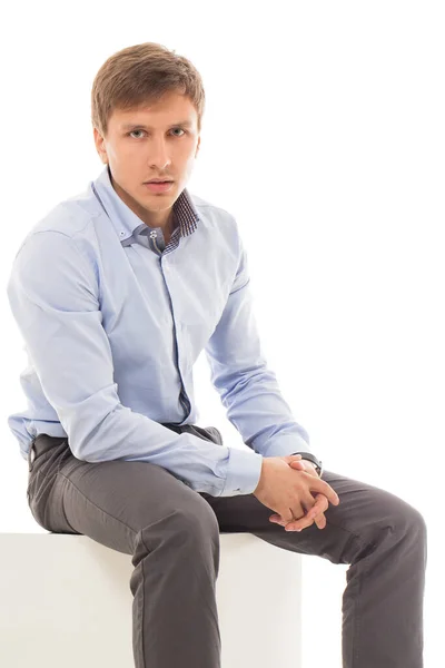 Handsome Man Shirt Trousers Sitting Cube — Stock Photo, Image