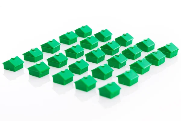 Muchas Casas Juguetes Verdes Sobre Fondo Blanco — Foto de Stock