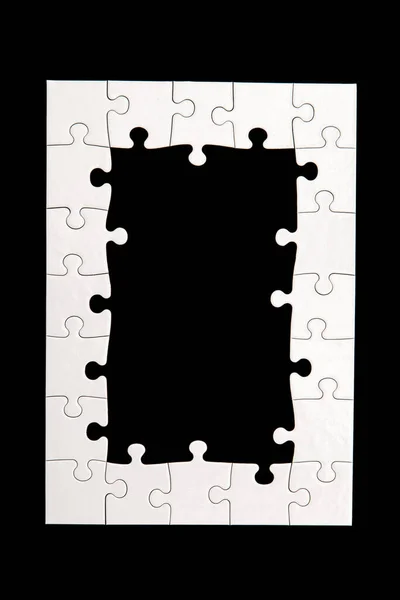 Fehér Puzzle Egy Fekete Háttér — Stock Fotó