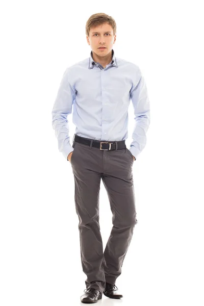 Handsome Man Blue Shirt Holds His Hands Pockets White Background — Stock Photo, Image