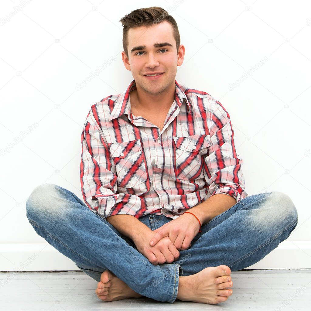Attractive man on the floor