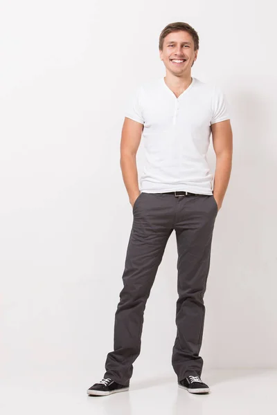Bel Homme Shirt Blanc Pantalon Gris Pose Sur Fond Blanc — Photo
