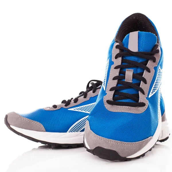 Beyaz Arka Planda Bir Çift Mavi Spor Ayakkabısının Resmi — Stok fotoğraf