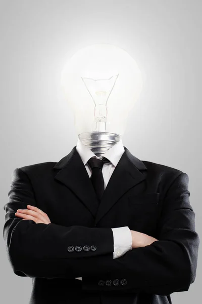 Businessman Torso Suit Lamp Instead Head Grey Background — Stock Photo, Image