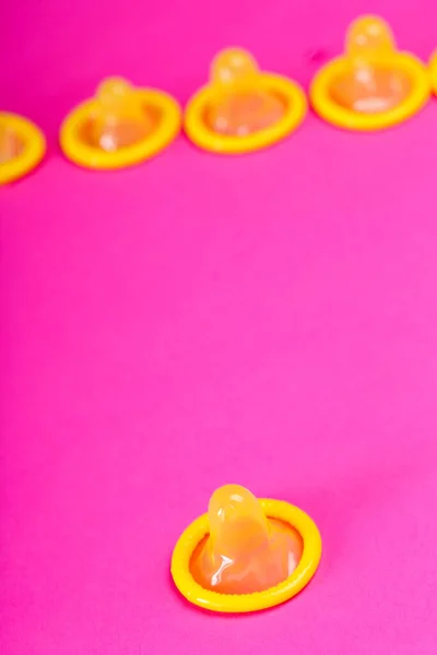 Yellow Condoms Table — Stock Photo, Image