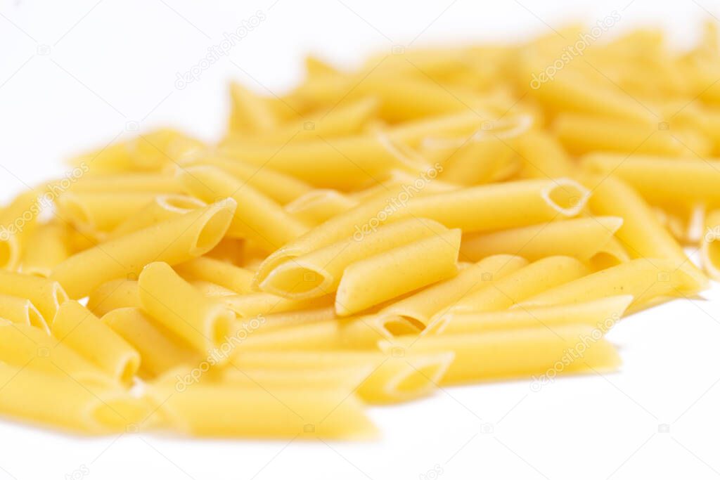 Large pile of raw macaroni