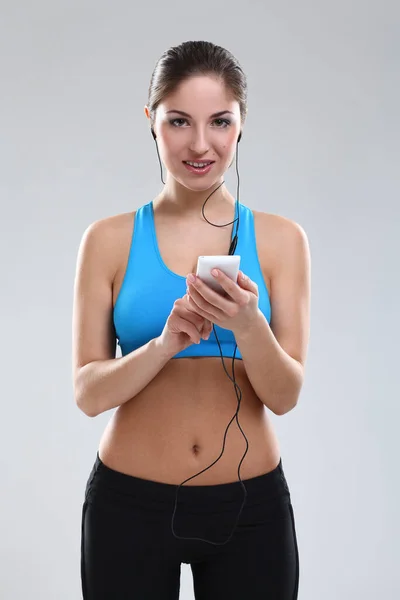 Mulher Branca Bonita Desgaste Fitness Com Fones Ouvido Sobre Fundo — Fotografia de Stock